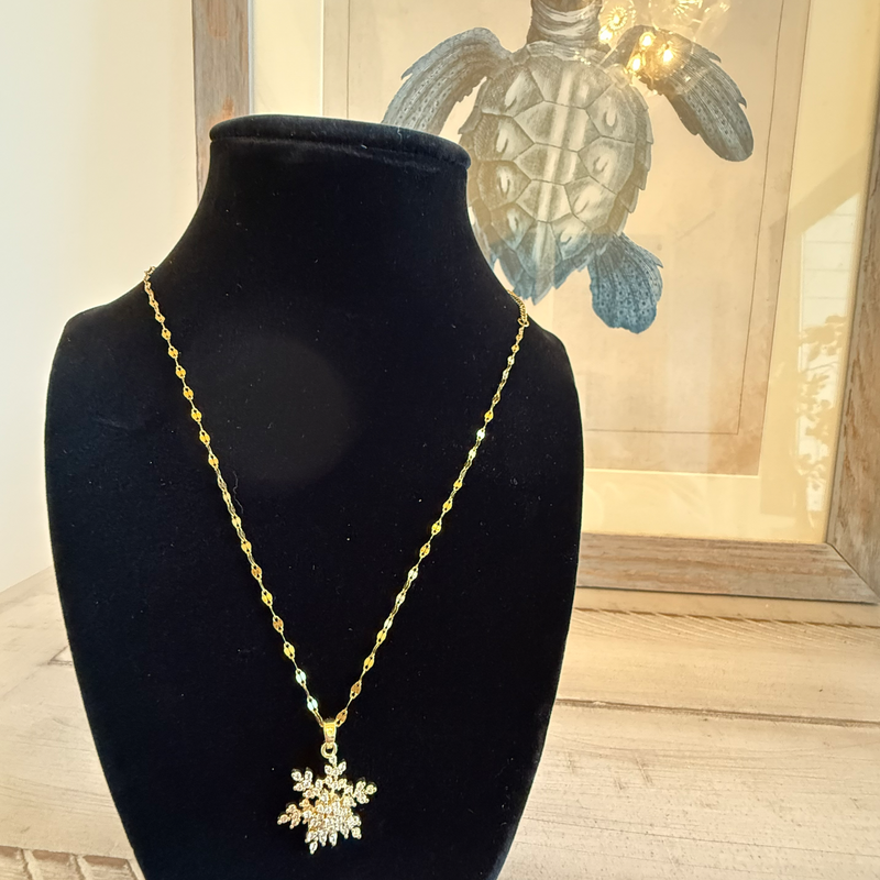 Golden Spinning Snowflake Necklace